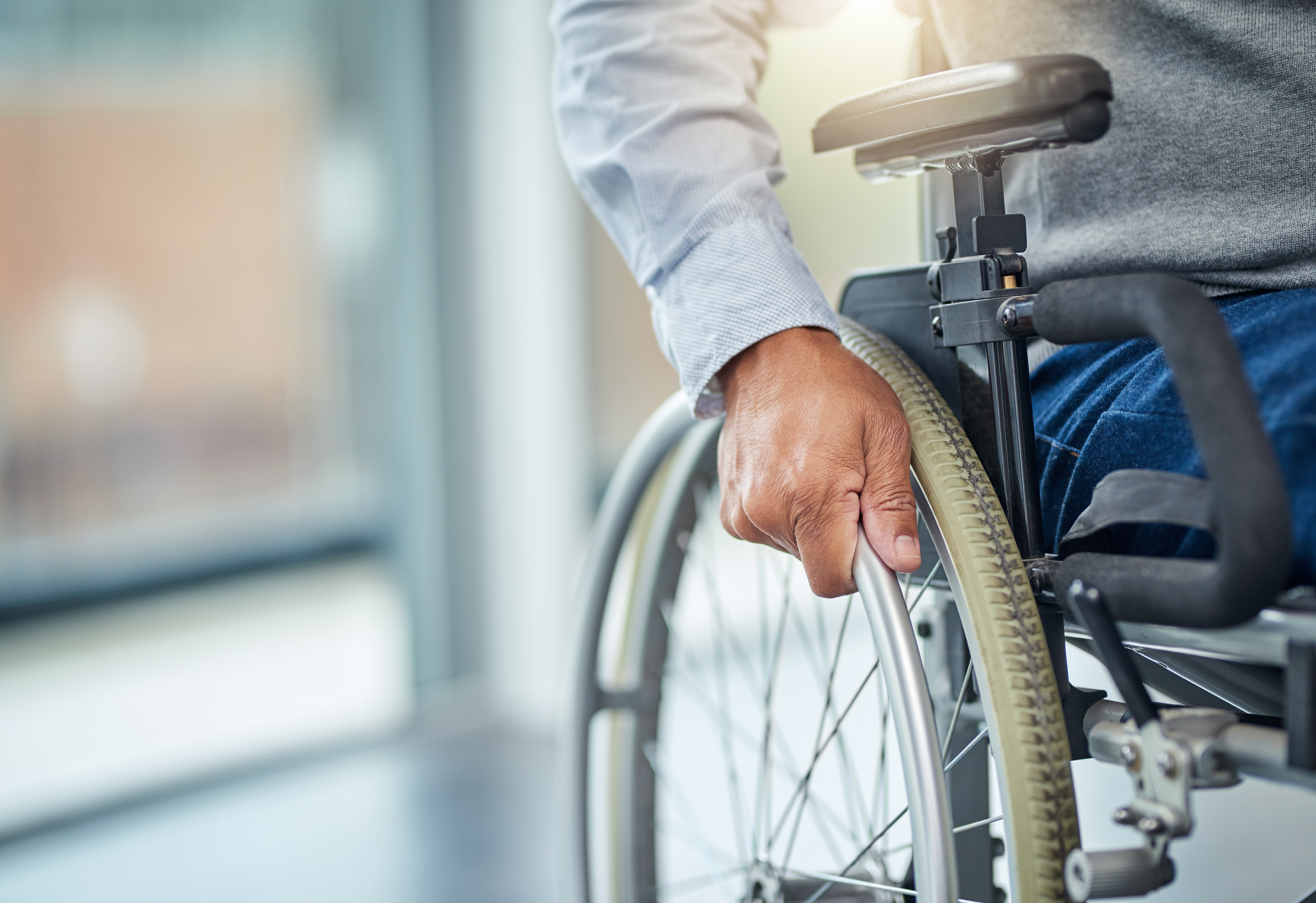 A man sitting in a wheelchair.